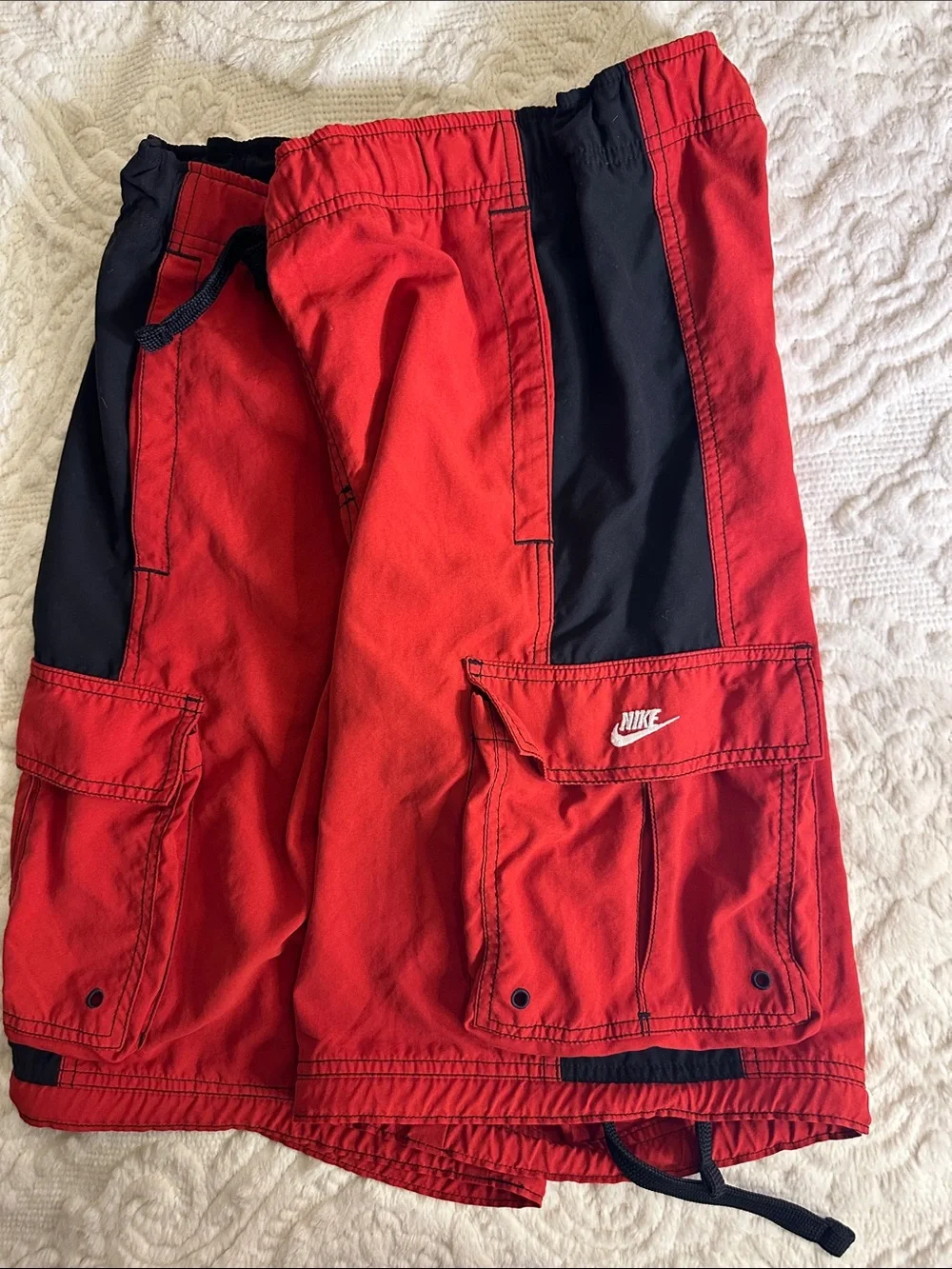 Nike Red Swim Shorts with Black trim and pockets